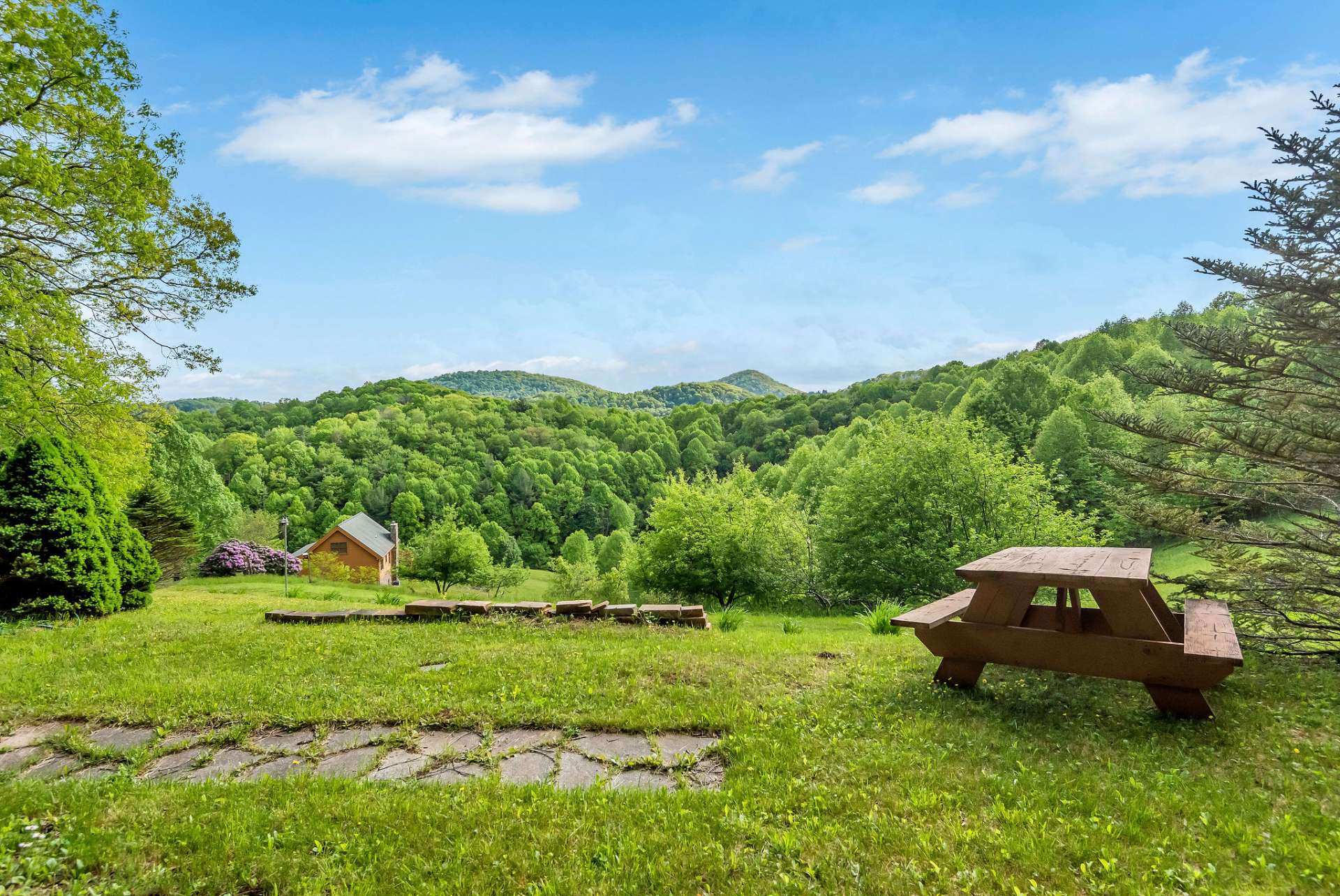 Enjoy picnics in your front yard with breathtaking views; there's no need to venture beyond your property for a scenic experience.